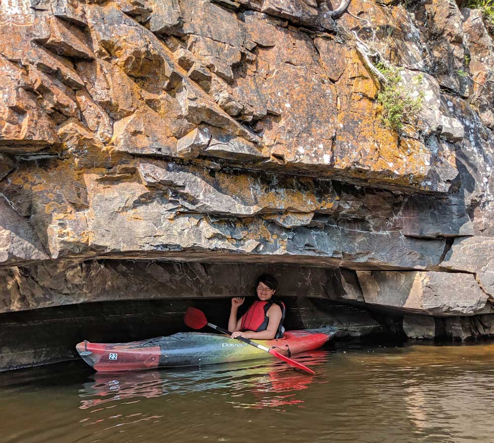 Kayaking in caves on the Barron Canyon walls